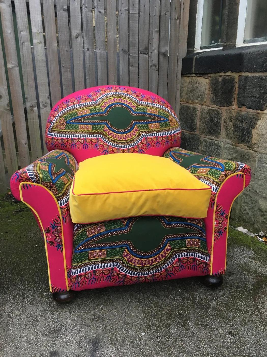 Armchair in a bold pink and yellow wax print