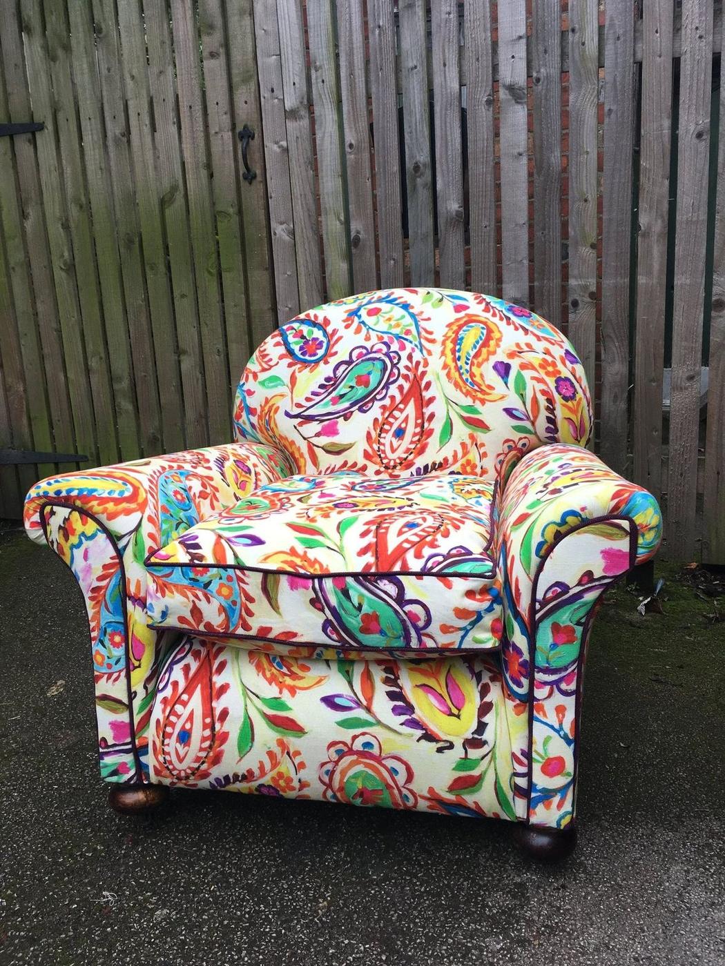 Armchair in a bright paisley fabric